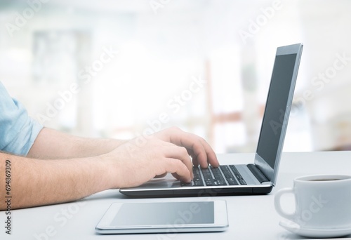 Business worker using laptop in office