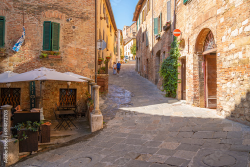 View of cafe and bar in narrow street in Montepulciano, Montepulciano, Province of Siena, Tuscany photo