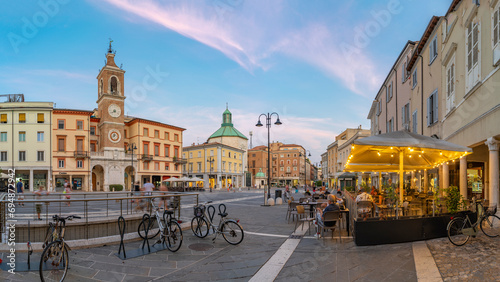View of restaurant and buildings in Piazza Tre Martiri, Rimini, Emilia-Romagna photo