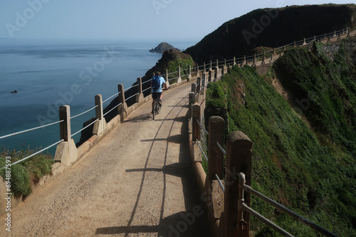 La Coupe, the causeway which joins Big and Little Sark, Sark, Channel Islands photo