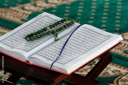 Open Quran and Muslim prayer beads on wood stand, Masjid Ar-Rohmah Mosque, Chau Doc, Vietnam, Indochina
