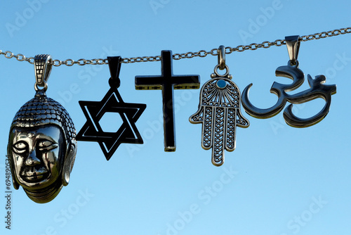 Religious symbols of Christianity, Islam, Judaism, Buddhism and Hinduism, Interfaith dialogue, France photo