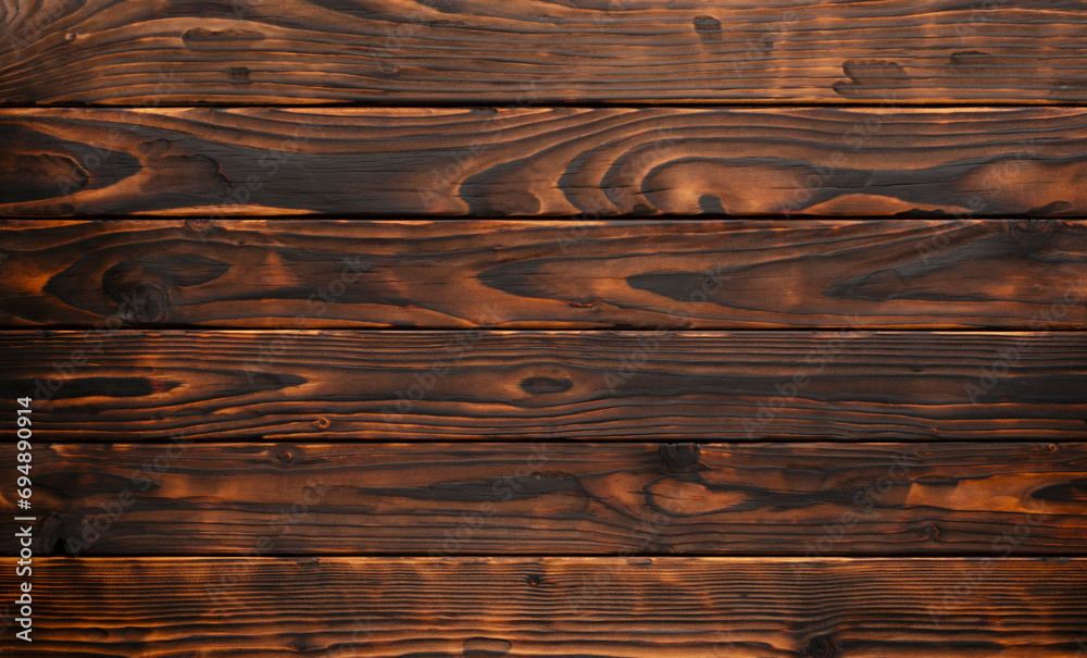 Burned wood planks natural flat lay background