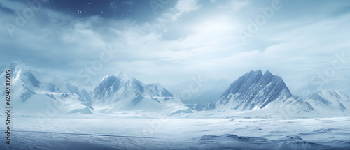 Snow-covered mountains in the distance, winter landscape with mountains and clouds