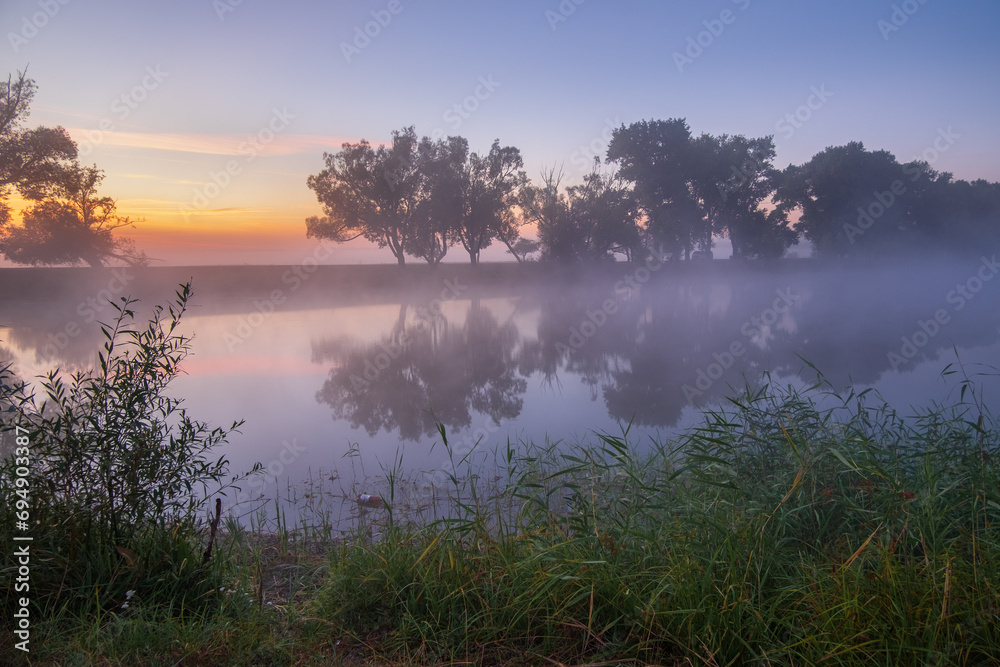 august sunrise over the river