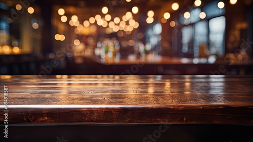 Empty wooden table in front of blurred café bar © petrrgoskov