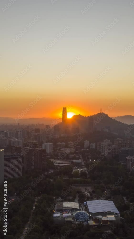 Santiago City Skyline at Sunset. Aerial Hyper Lapse, Time Lapse. Las Condes Commune. Chile. Drone Flies Sideways. Vertical Video Santiago City Skyline at Sunset. Aerial Hyper Lapse, Time Lapse. Las Condes Commune. Chile. Drone Flies Sideways. Vertical Video