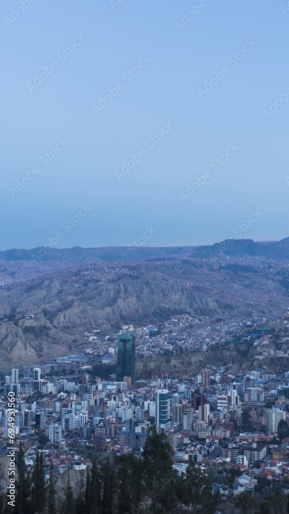La Paz Skyline at Sunrise. Zona Sur District. Bolivia. Night to Day Time Lapse. Vertical Video La Paz Skyline at Sunrise. Zona Sur District. Bolivia. Night to Day Time Lapse. Vertical Video