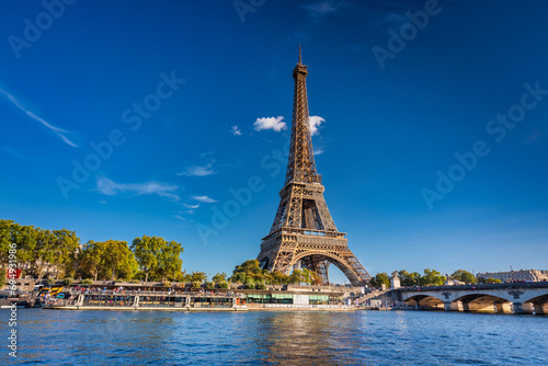 Cityscape of Paris with Eiffel Tower at sunny day. France