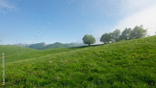 Fast moving clouds over a hill in the Parco dei Mille Laghi located in the Italian region of Emilia Romagna.
