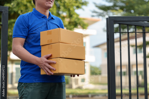 small business Independent company owners, couriers pack boxes of online orders for delivery. Handing a box to a customer, SME business concept, service.