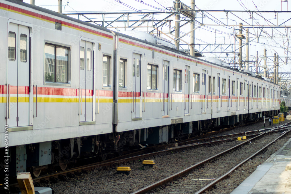 commuter line at the departure station. railway with train photography