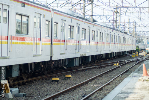 commuter line at the departure station. railway with train photography photo