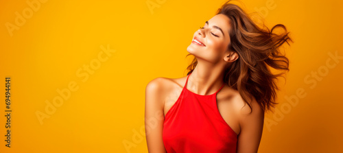 attractive stylish young woman in red dress