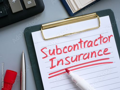 Φωτογραφία Subcontractor insurance written on a clipboard.