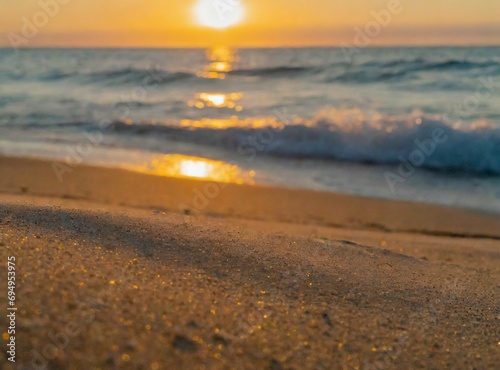 Beautiful gold sunset on the beach coast over the sea landscape. Summer vacation travel.