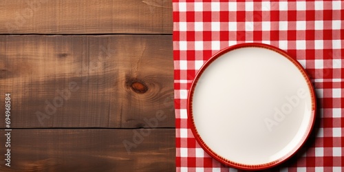 A plain plate against a checkered cloth, suggesting a home meal photo
