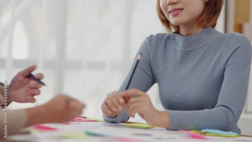 Close up of hands teamwork business startup group are meeting working and brainstorming for new business Close up of hands teamwork business startup group are meeting working and brainstorming for new business