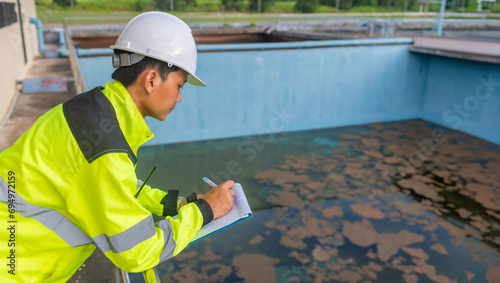 Environmental engineers work at wastewater treatment plants,Water supply engineering working at Water recycling plant for reuse