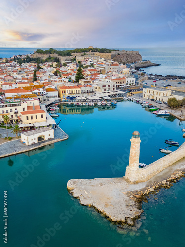 Old harbor and lighthouse of Rethymno in Crete, Greece. photo