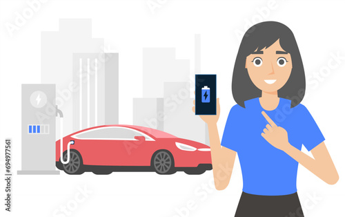 The girl is charging an electric car, turn on the phone to check the battery