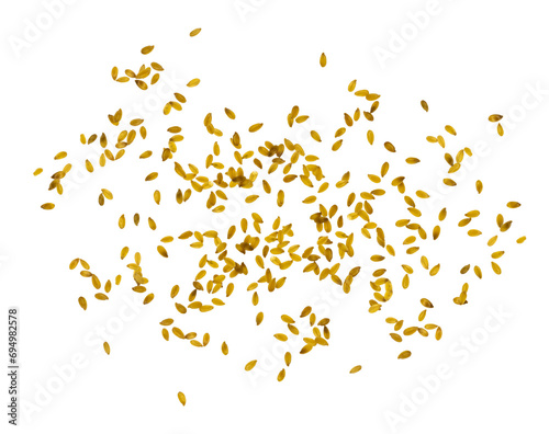 Scattered Grains of Golden Flax. Golden Flaxseeds Chaotic Spread out. No Background. Top View. Natural Plant Source of Omega-3 and Vitamins. Vegan Natural Healthy Food. 