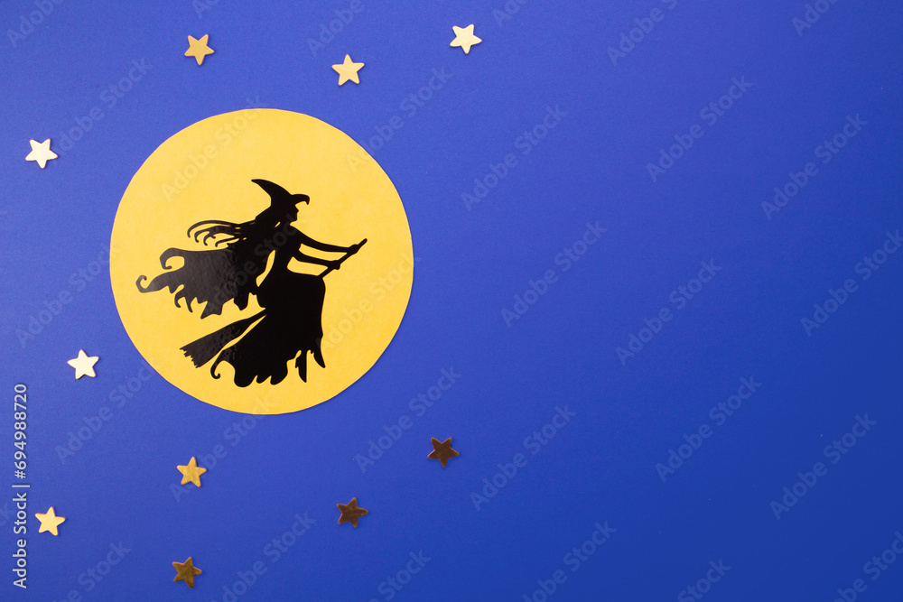 Witch Befana flying on broomstick, moon light.Epiphany day tradition, top view, flat lay, greeting card