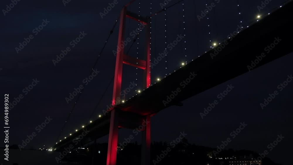 Stunning close up of red illuminated cable-stayed bridge. Night sky Stunning close up of red illuminated cable-stayed bridge. Night sky