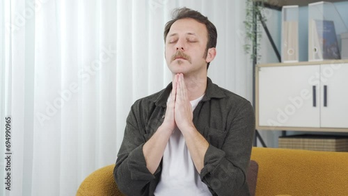 Christian man prays.