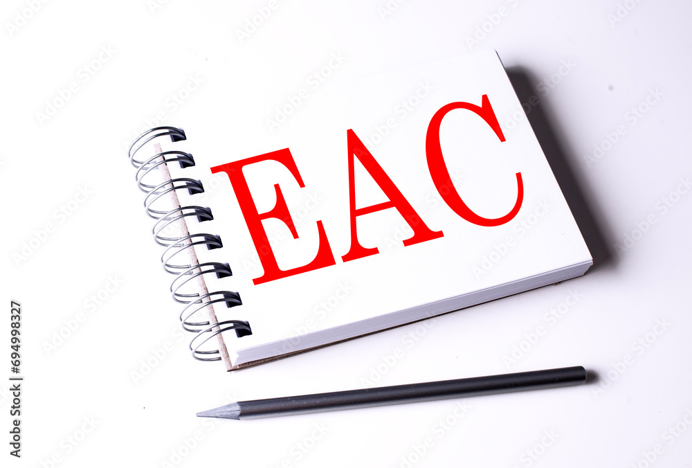 Text EAC on notebook on the white background Text EAC on notebook on the white background