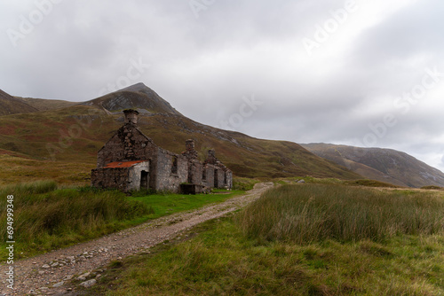 Amaizing old cottages serve now as a bothy for hikers. You can freely stay there for a night. Scottish highlands really have something to offer. Stunning landscape and wild nature. photo