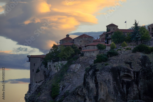 Greek Rock Monastery and Majestic Sunset Clouds