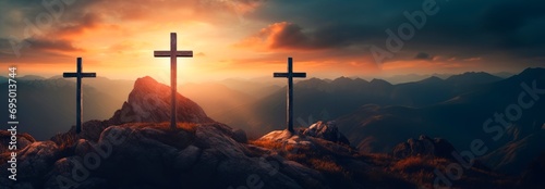 Crucifixion Of Jesus Christ At Sunrise three  christian cross es on top of a Hill at sunset, easter and christian concept, horizontal background, copy space for text photo