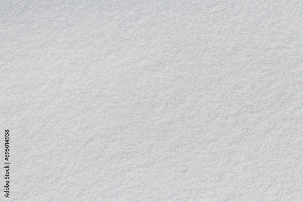 Snow texture. White surface of snow with clearly defined texture