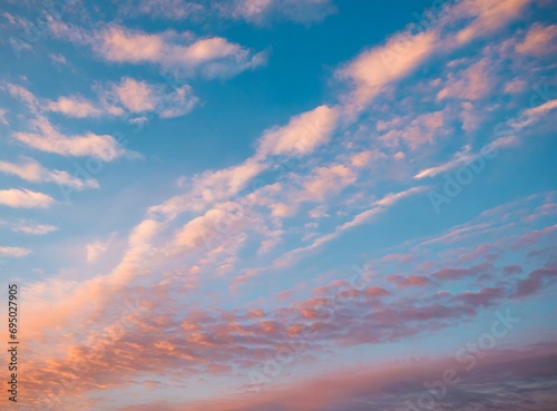 Sky at sunset, sky at sunrise, clouds, orange clouds cirrus clouds, cumulus clouds, sky gradient, sky background at dusk, twilight, nightfall, pink sky, pink clouds, sun, environment, background © D'Arcangelo Stock