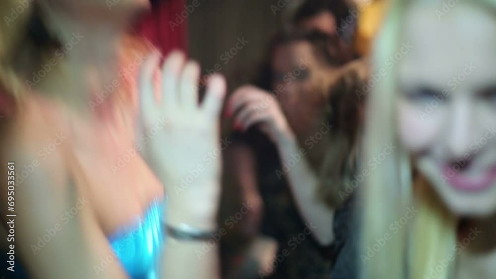 DJ, thirteen young guys and girls have fun and dance at party DJ, thirteen young guys and girls have fun and dance at party