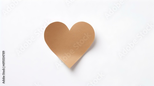 Light Brown Paper Heart on a white Background. Romantic Template with Copy Space
