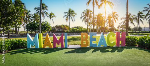 Colorful Miami beach sign in Lummus park at sunset, Miami, Florida. photo
