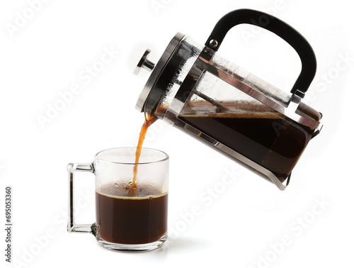 French press coffee maker pouring coffee into cup isolated on white background. Mechanical coffee press pot. photo