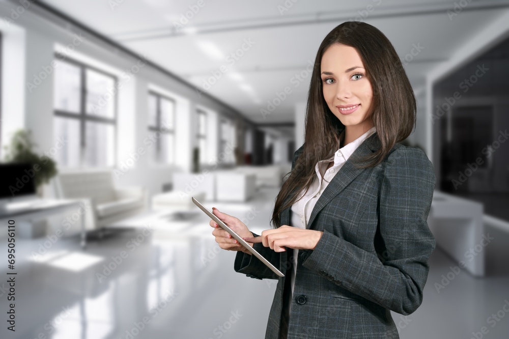 Portrait of confident businesswoman in office at work Portrait of confident businesswoman in office at work