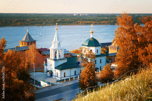 View of the Volga, the Temple of Simeon the Stylite in the Kremlin in golden autumn. Nizhny Novgorod, Russia photo