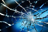 Detailed close-up of a damaged car windshield with clearly visible cracks and shattered glass