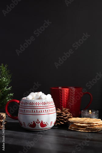 close up hot chocolate with marshmallow and cookie for the holiday festival. cozy drink for christmas and new year wvw.