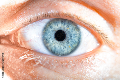 Male Blue Colored Eye With Long Lashes Close Up. Structural Anatomy. Human Iris Macro Detail.