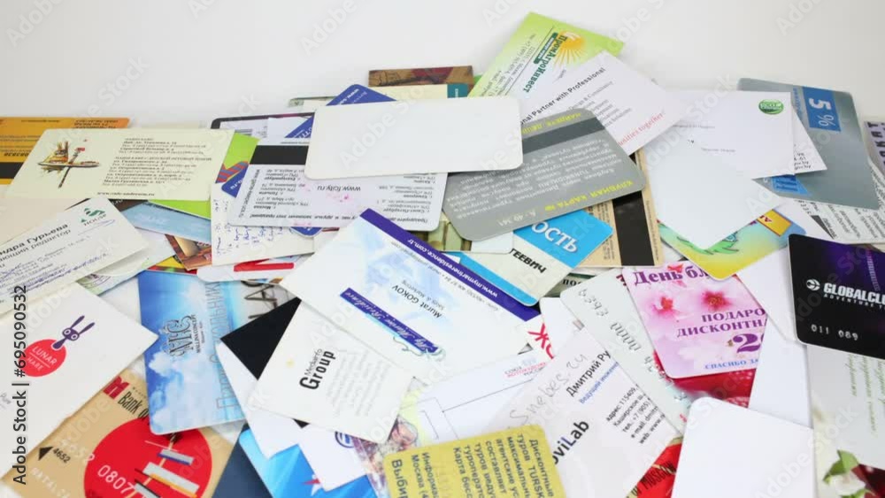 appears on the table a pile of business cards and then disappears