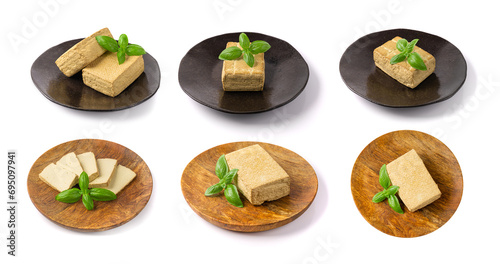 Tofu Cheese Isolated, Smoked Vegan Cheese Slice, Sliced Soya Bean Curd, Soy Protein or TSP photo