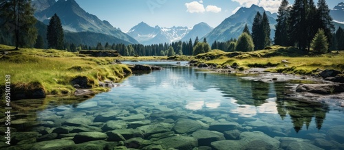 Very beautiful mountain lake in the green mountains photo