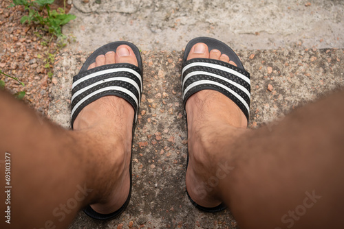Summer Vibes: Close-Up POV of Feet in Flip-Flops