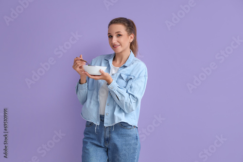 Young woman with chicken so...