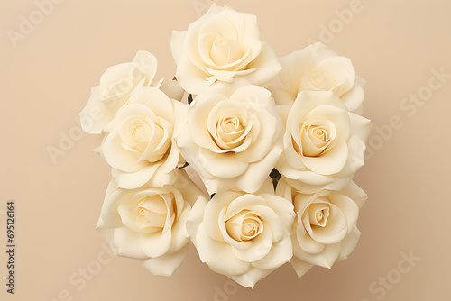 beautiful blooming white roses on beige background © Marina Shvedak